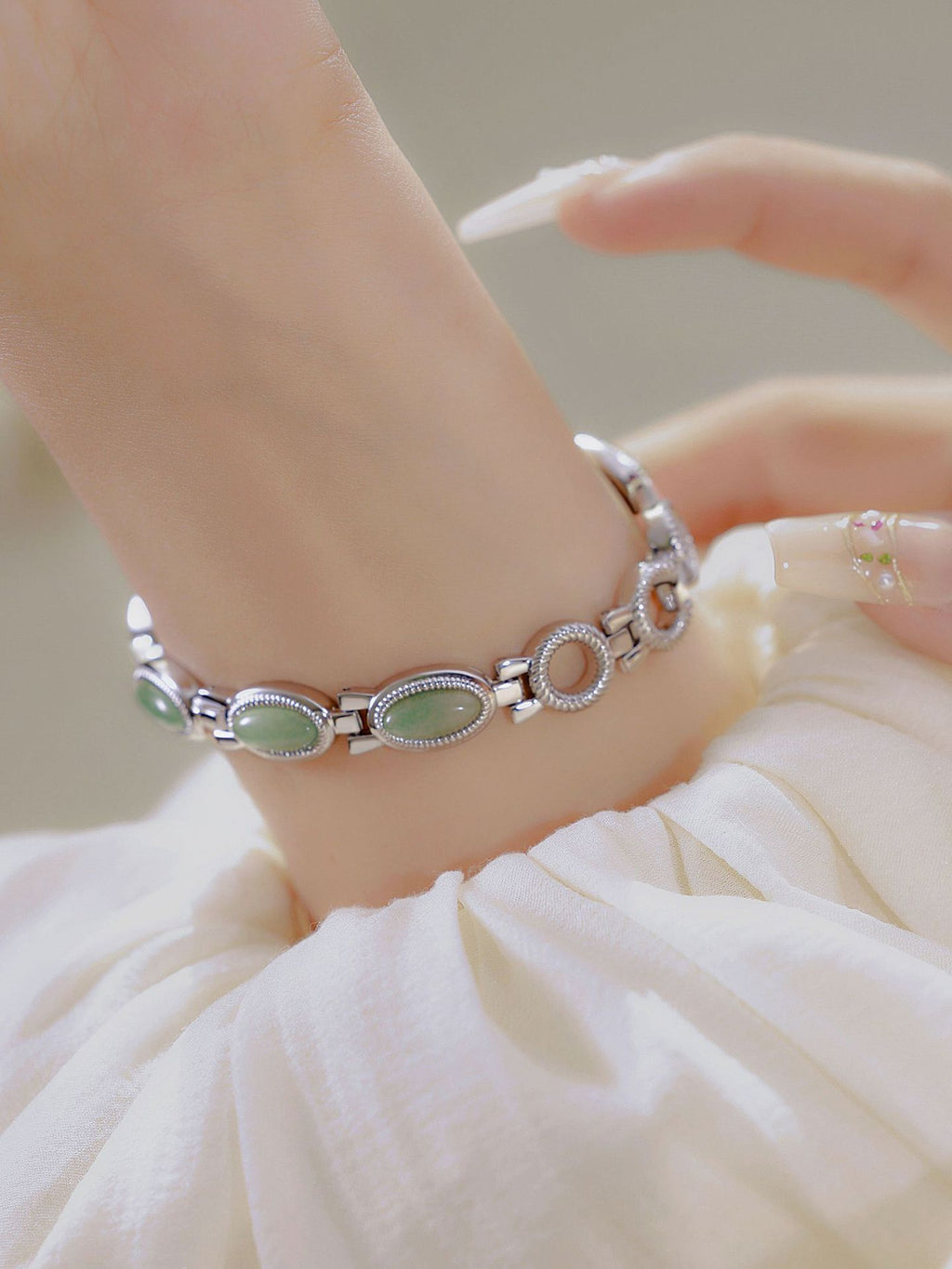 Oval Dial Green Gemstone Link Bracelet Watch