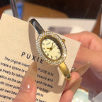 Oval Roman Crystal Bezel Bangle Watch