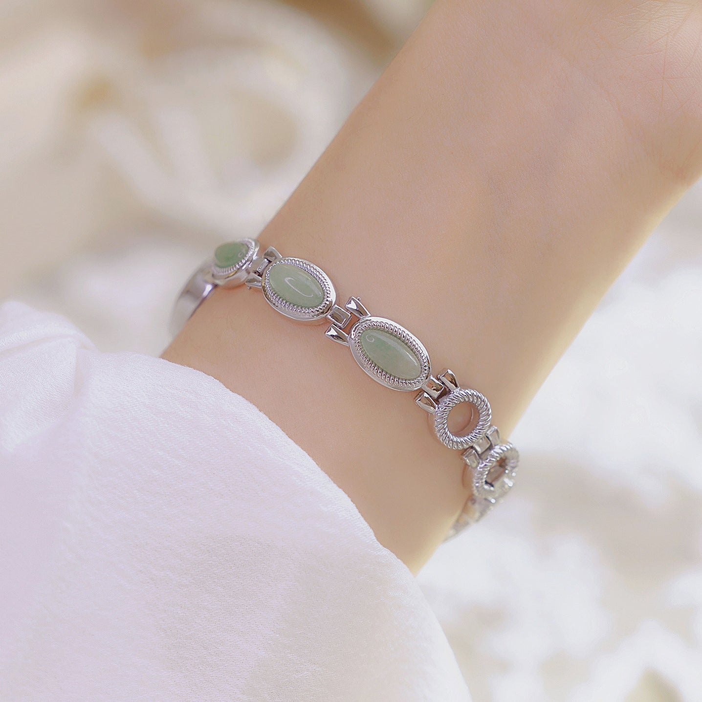 Oval Dial Green Gemstone Link Bracelet Watch
