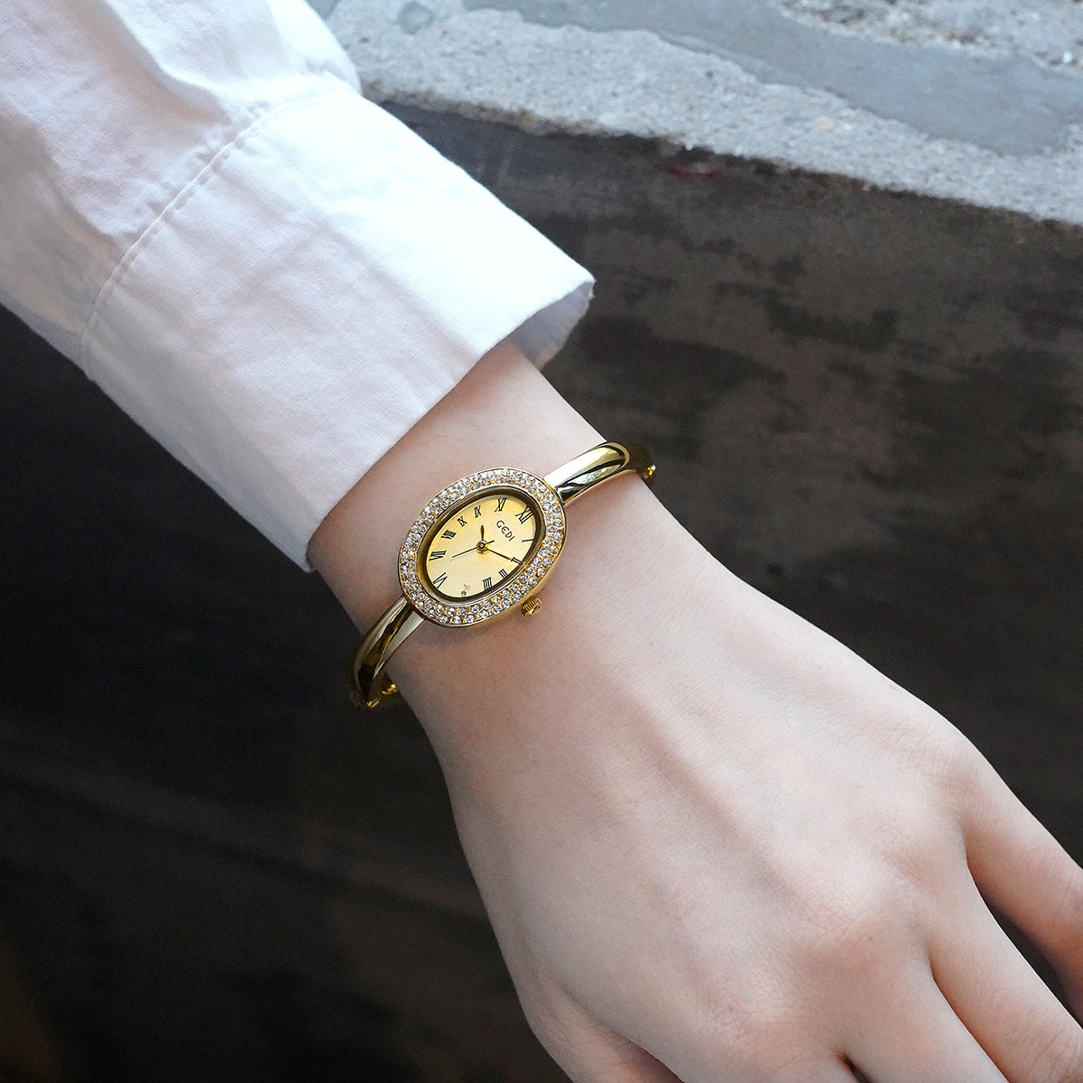 Oval Roman Crystal Bezel Bangle Watch