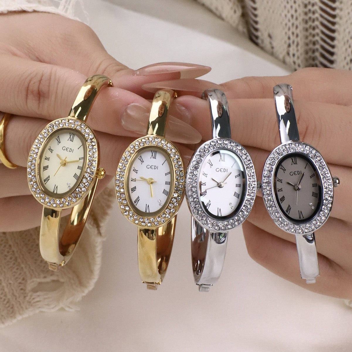 Oval Roman Crystal Bezel Bangle Watch