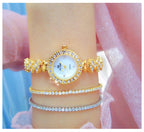 Round Crystal Bezel Floral Link Watch