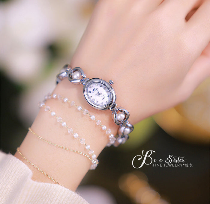 Oval dial pearl link watch silver white pearl
