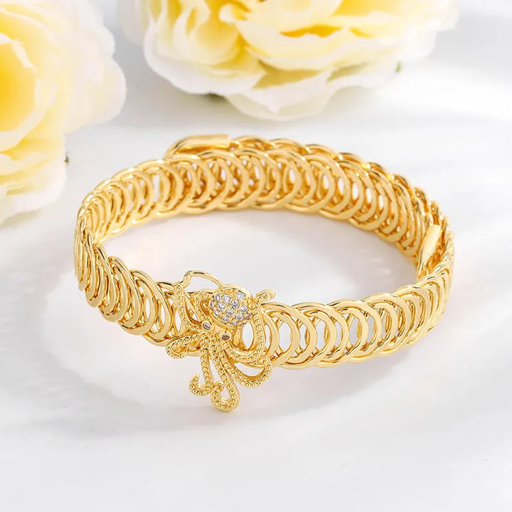 Gold Marine Zircon Cuttlefish Bangle